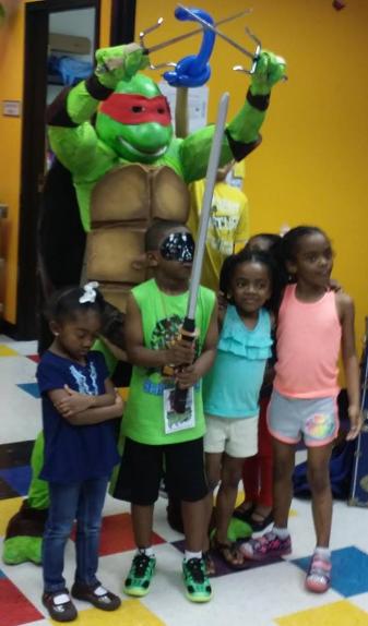 Raphael ninja turtle rental superhero costume for birthday party at pump it up in Houston, Texas.
