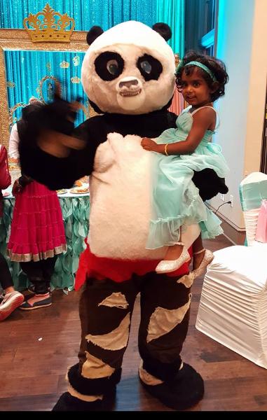 Kung Fu Pandas mascot costumed characters plays with new friends in Sugarland at her Birthday party.