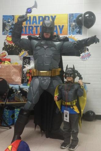 Batman's suit is solid with a fully functioning utility belt for super hero birthday costumed character parties in Houston, Texas.