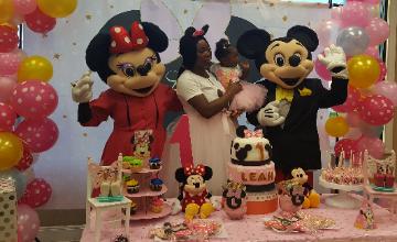 Mice just want to have fun in Pearland with mascot costumed characters for cake and pictures.