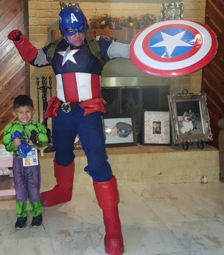 Our Captain america costumed character is special because the costume fits to make him look athletic, has a solid helmet, and a solid metal reinforced shield for parties in Houston,Texas birthday fun for kids.