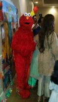 Elmo from sesame street for rental in sugarland, texas for a mascot party.