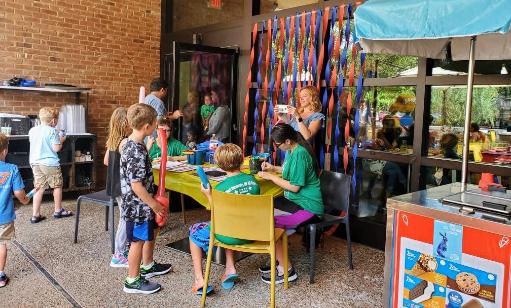 Rent some face painters and balloon twisters for your special corporate event like this one at Hungrey's cafe on University