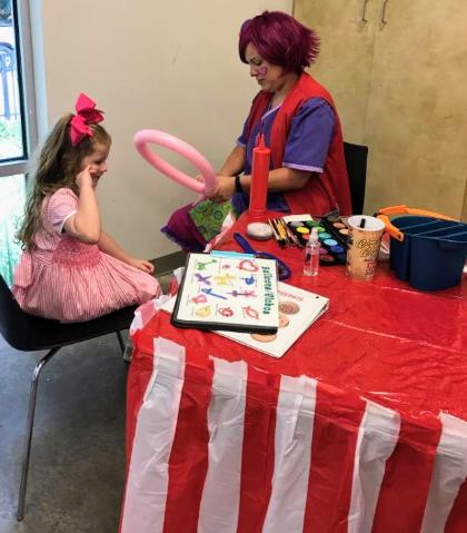 Rent our circus and carnival package for your child's birthday party in West UNIVERSITY WITH GAMES, face painting, balloons, and awesome pictures 
