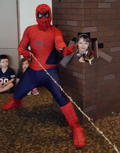 Houston superhero party spiderman rental for birthdays withe excellent props for pictures like the webline and the brick wall.