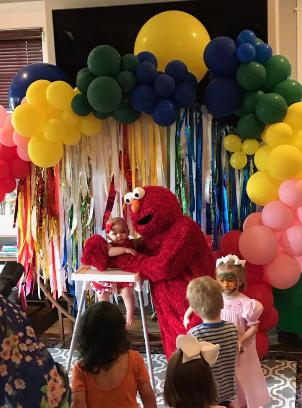 Rent this red monster mascot costumed character for your kids birthday party like this one in the Heights