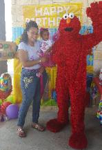 Hire a mascot costumed character for your sesame street elmo birthday party in Houston, Texas.