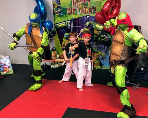 Party characters for kids in Houston 2 superhero turtle characters with 2 twins in Greatwood