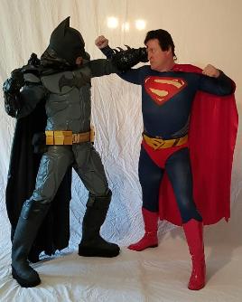 Superman and Batman battle at your superhero party for your child's birthday party in Houston, Texas.